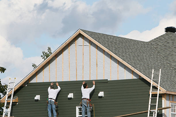 Professional Vinyl Siding technician working in Queen, PA